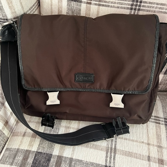 Coach Messenger Bag - fabric with metal closures.Easy to carry